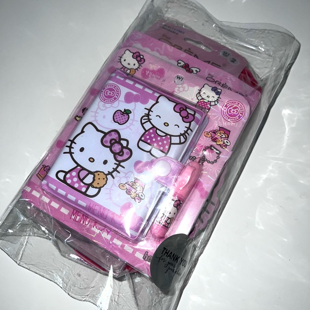HELLO KITTY 5 PC Bundle NWT 2 Pr Socks, Face Mask Crémé Eye De-Puffer & Notebook - Picture 6 of 8